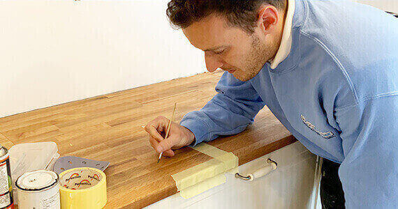 Ceramic Sink Repair Manchester - Surface Doctor expert technician performing professional kitchen and bathroom ceramic sink restoration using advanced repair techniques and precision tools in Manchester home